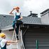 2 Baron's Chimney Service employees at work on a roof performing Sea Girt chimney service